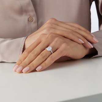 Goldsmiths 18ct White Gold 0.75ct Diamond Oval Cluster Engagement Ring Goldsmiths 18ct White Gold 0.75ct Diamond Oval Cluster Engagement Ring