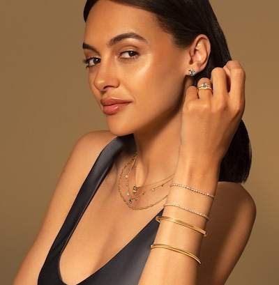 Shop Gemstone engagement rings on Goldsmiths image