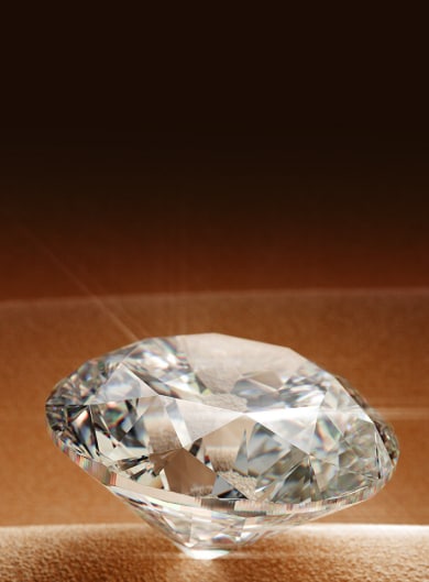 Goldsmiths Signature Diamond on sandy background image